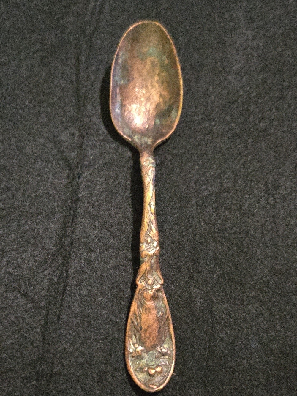 Antique Metal Spoon in Aged Bronze